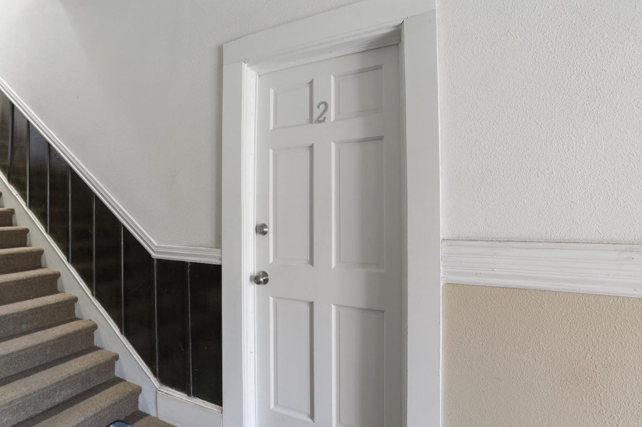 Entry door for 18 W 8th Street Unit 2 rental property
