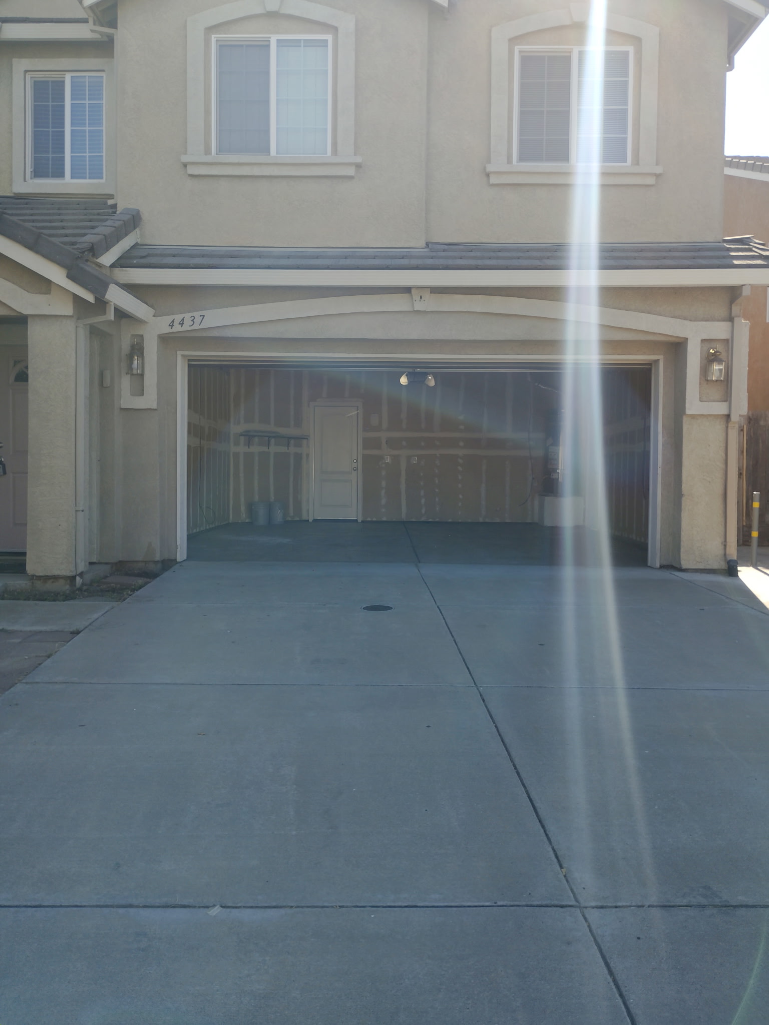 Two-car garage and driveway at 4437 Giselle Lane