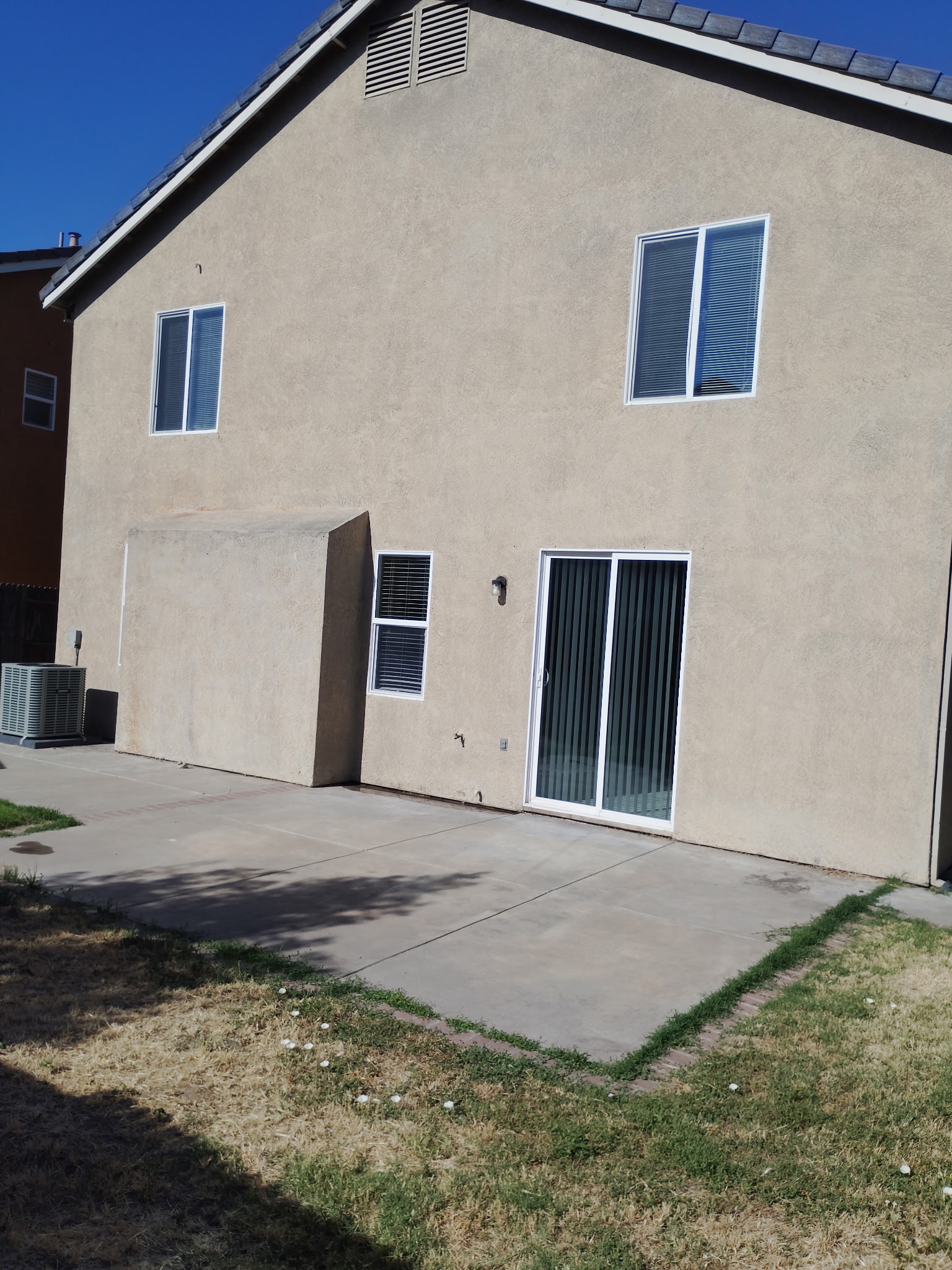 Rear exterior and patio at 4437 Giselle Lane