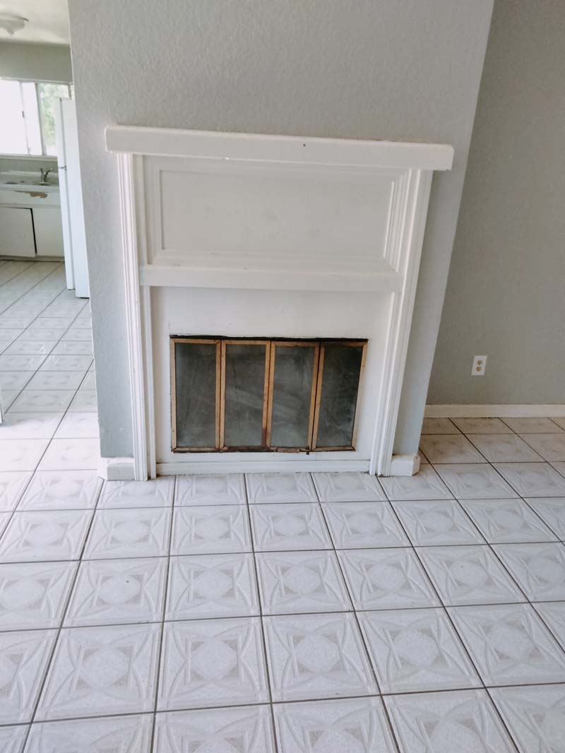 Living room with white fireplace mantel at 674 Gannet Ct